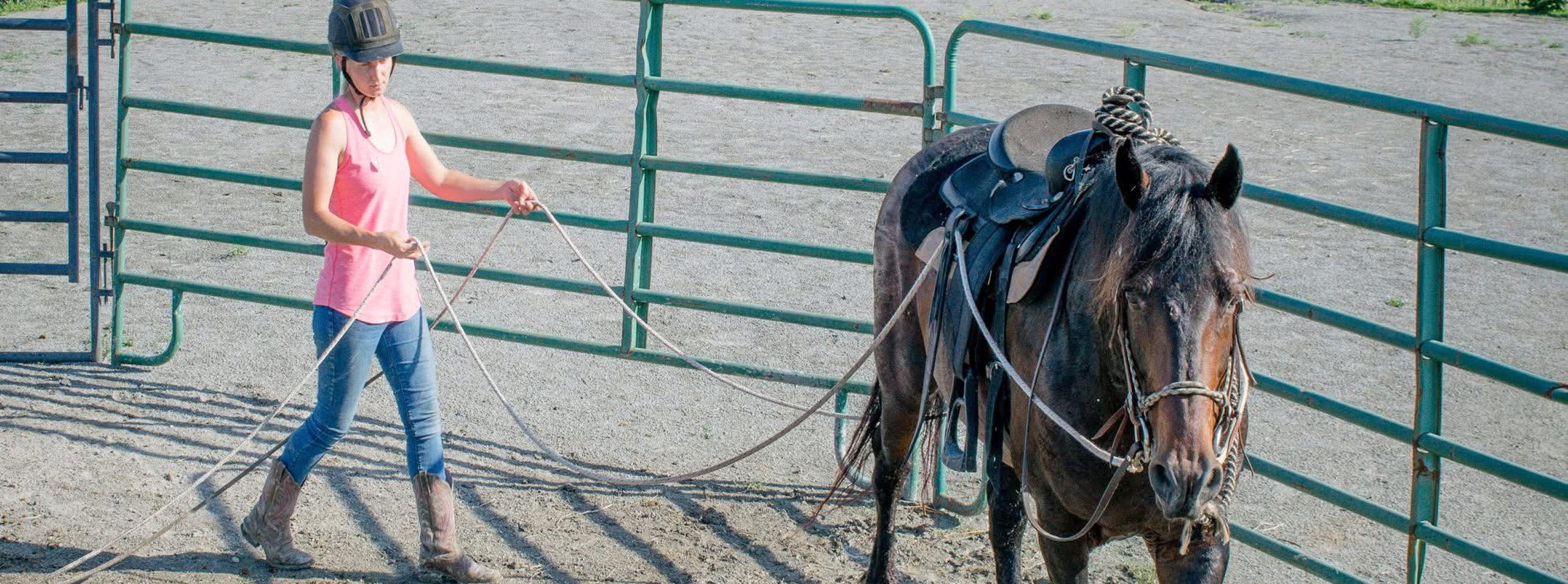 Oliva Dixon working with a horse