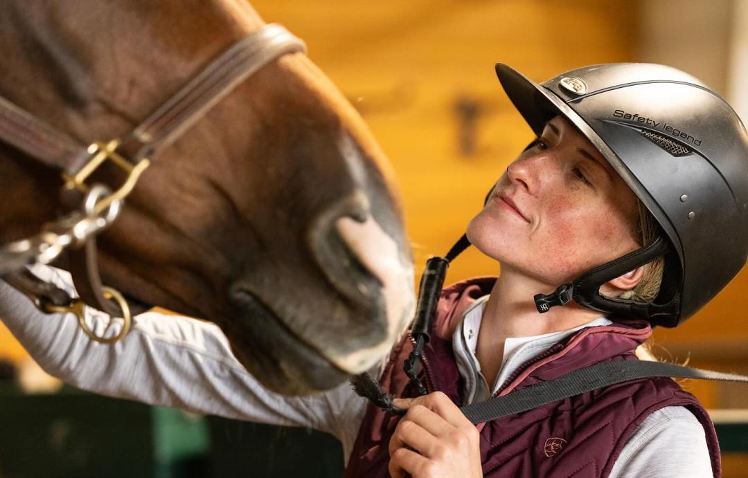 Veterinarian cares for a horse to symbolize Share the Care program